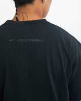 Vintage Nike Michael Vick Football Tee <br>L , The Real Deal , newtown, sydney, australia, thrift store, opshop, preloved, secondhand, sustainable, retro, antique, 70s, 80s, 90s, 2000s, 00s, fashion, clothing, streetwear, trendy, garment, style, boutique, store, shop, archive, sale, cheap, best, top