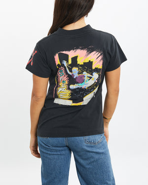 front full body shot of model wearing a Vintage 1990 Ocean Pacific Skate Tee, colour Black, size XXS